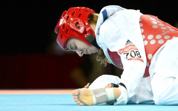 Imagem: nataliafalavigna taekwondo afp 95 Falavigna se lesiona e perde para sul-coreana nas oitavas de final