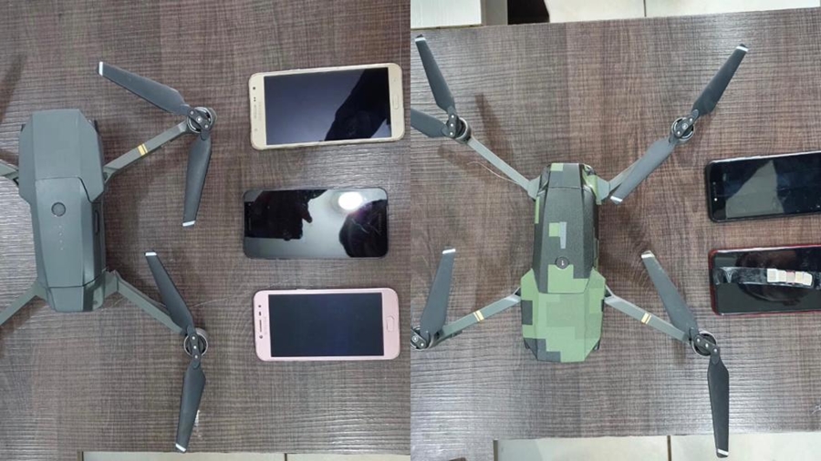 Imagem: drone e material Polícia penal apreende dois drones com celulares, chips e drogas